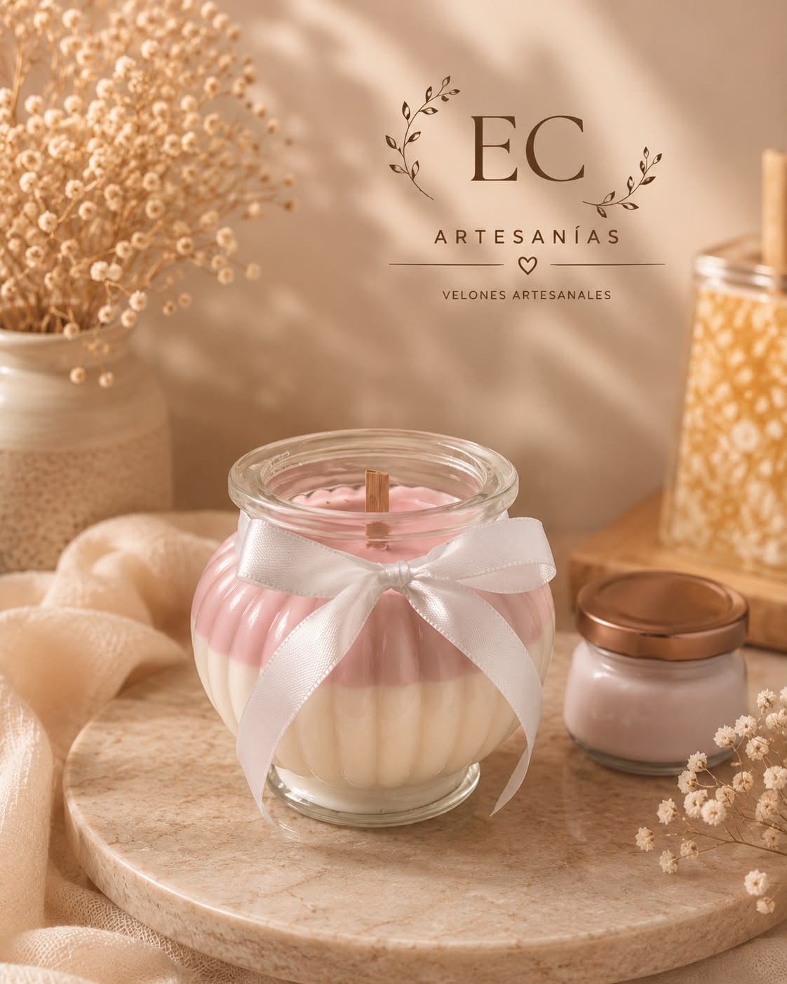 Velón artesanal rosa y blanco con lazo